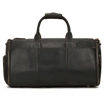 Vintage brown cowhide leather garment duffle bag with zipper closure and shoulder strap

