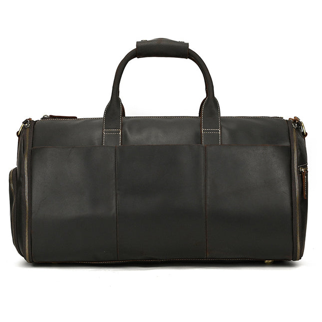 Vintage brown cowhide leather garment duffle bag with zipper closure and shoulder strap

