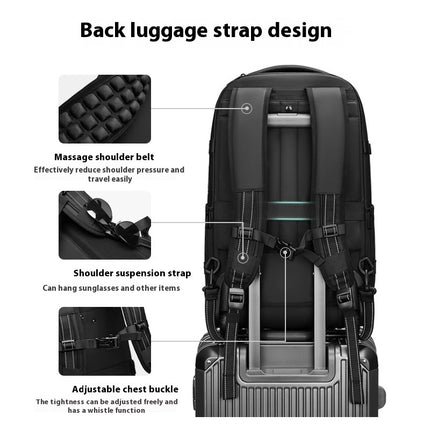 Showing a massage shoulder belt, shoulder suspension strap, and adjustable chest buckle on a Black Mova Elite Pro-Vac vacuum compression travel backpack with a built in compression system, USB charging port, TSA customs combination lock, wheels and telescopic handle