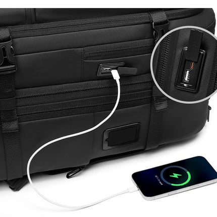 Black Mova Elite Pro-Vac vacuum compression travel backpack with a built in compression system, USB charging port, TSA customs combination lock, wheels and telescopic handle