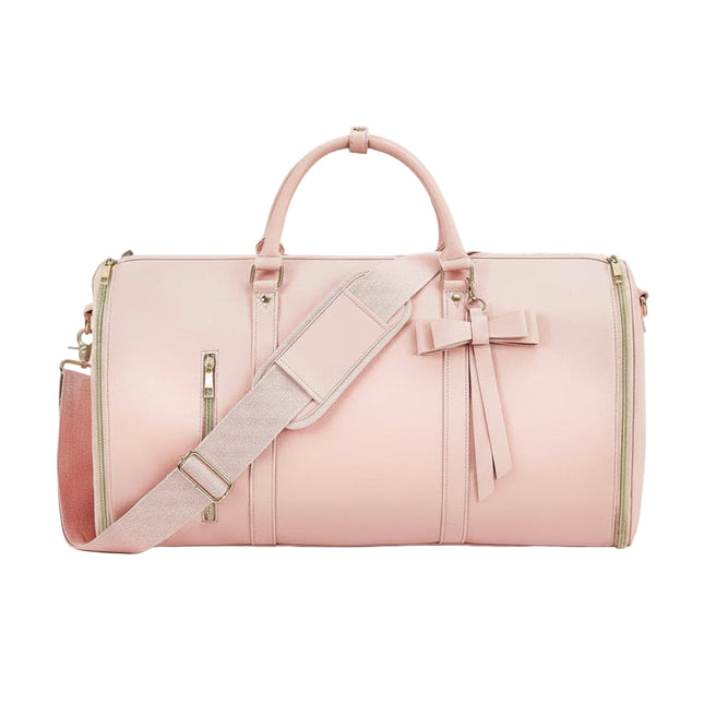 Pink Mova Luxe travel duffle with signature bow detail and PU leather exterior
